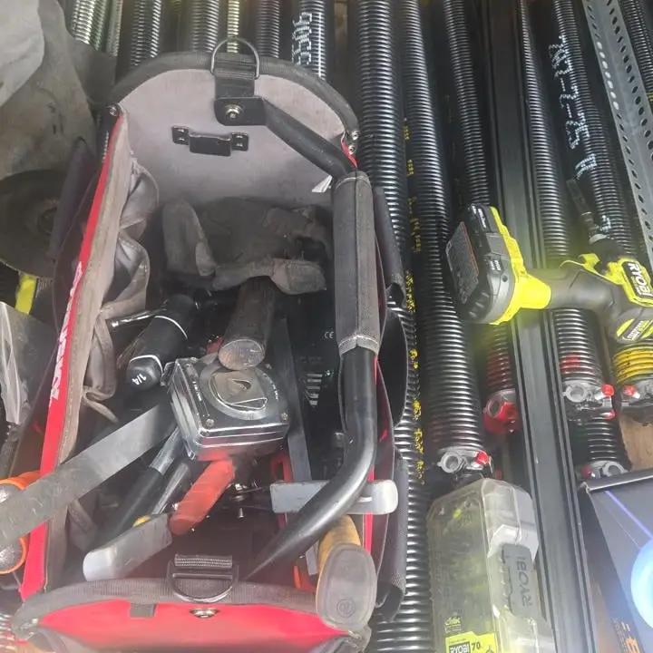 Close view of the spring and cable hardware stored on a service truck